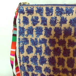 Colorful raffia clutch with striped zipper pull